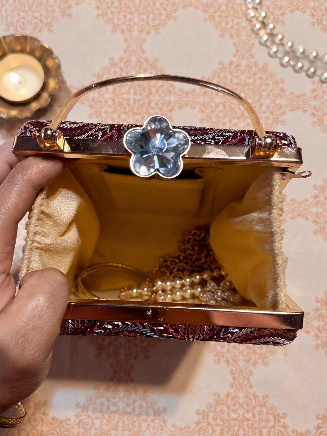 Embellished golden clutch open