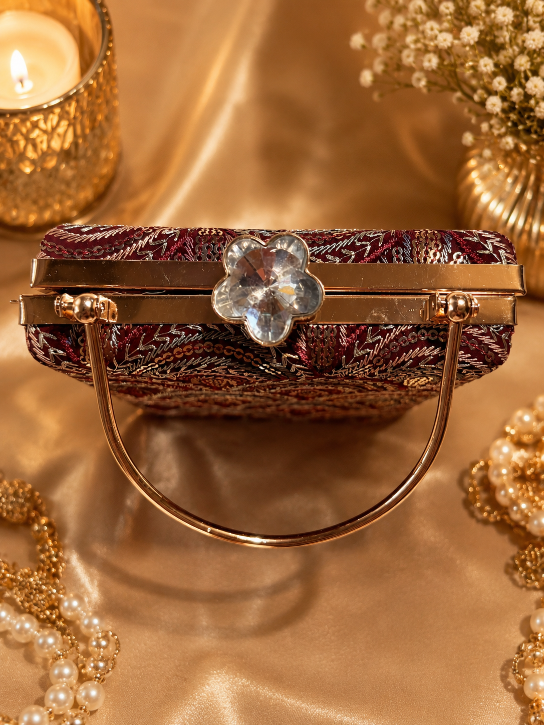 Embellished purple clutch