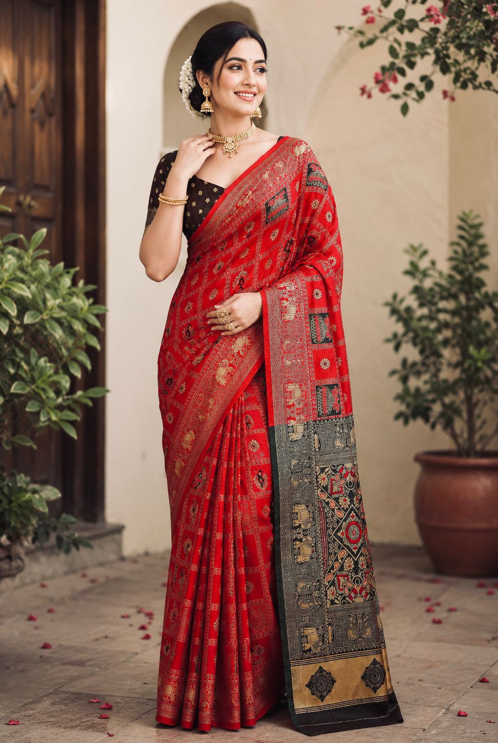 Patola red and green saree