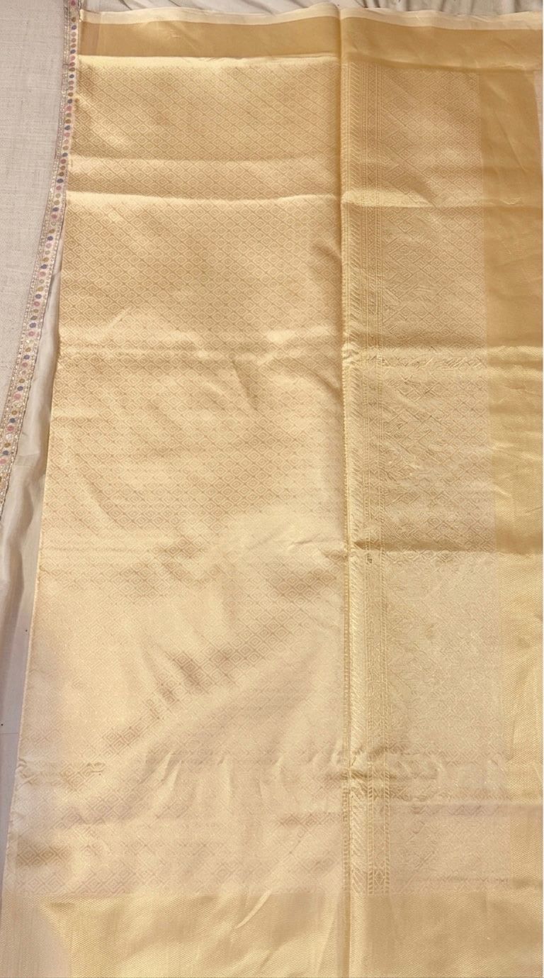 Banarasi beige and gold saree